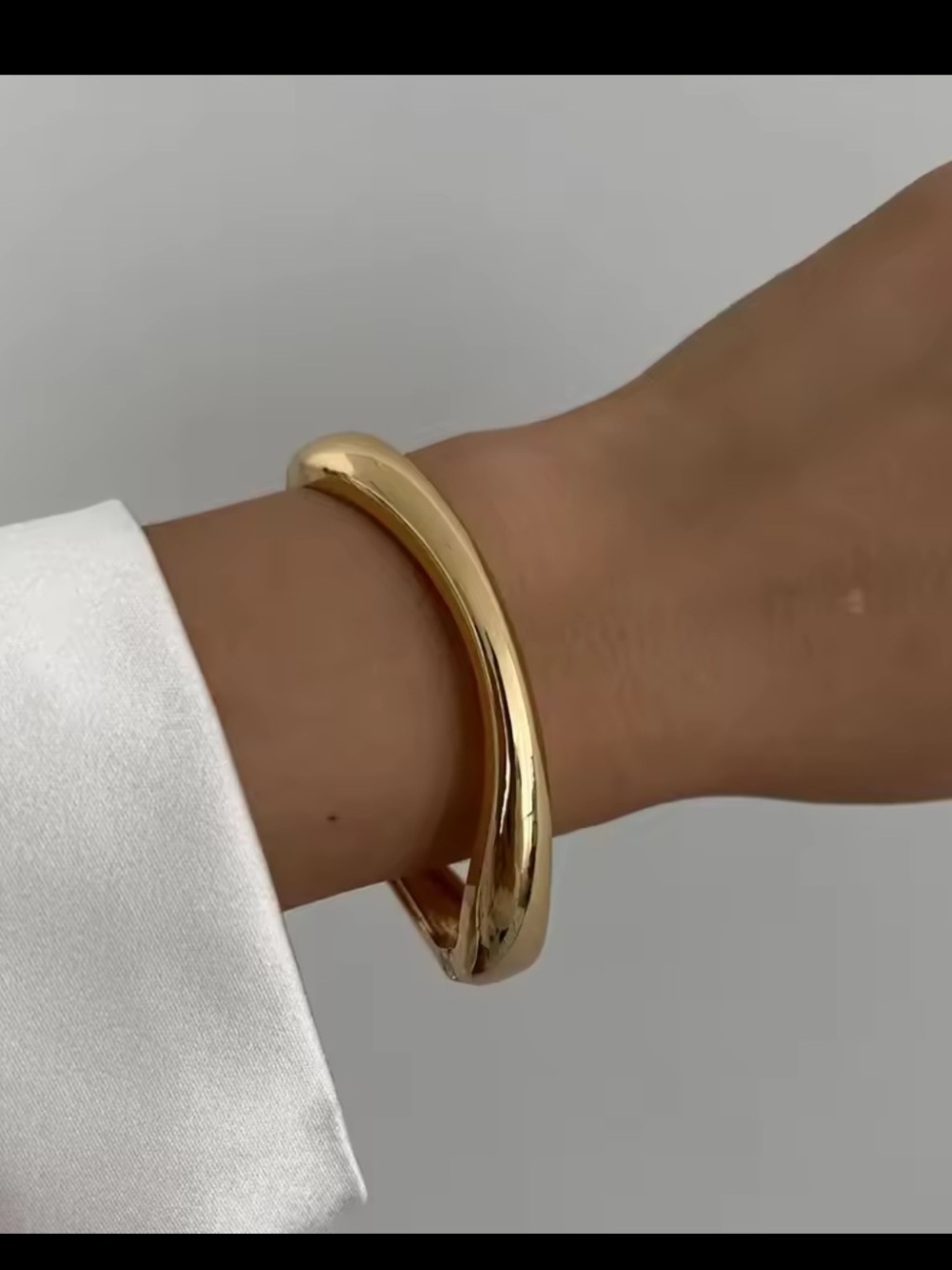 Polished Gold Curved Hinged Bangle